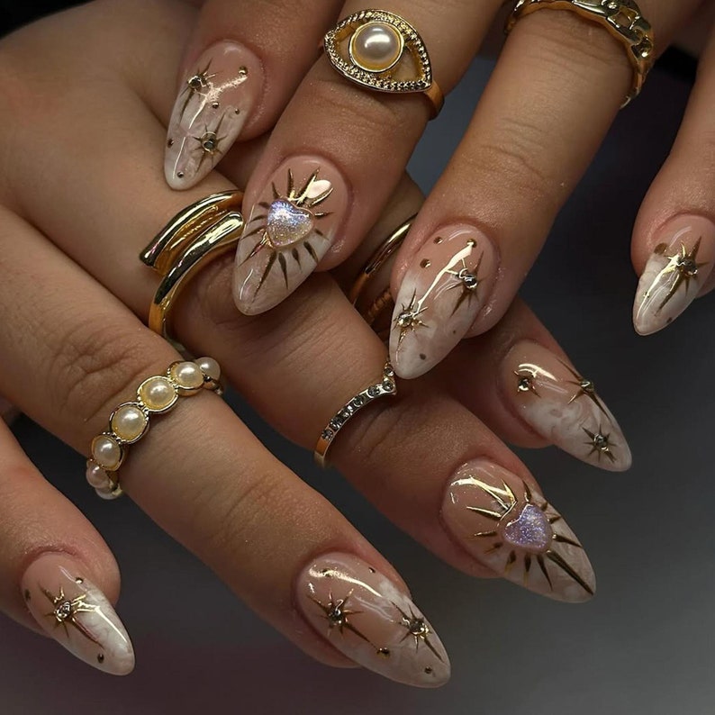 Luxury Nude Gold Almond Nails | Shimmer Gold & Star Fake Nails | Elegant Astrology Nail Art | Ethereal Sun Short Press On Nails