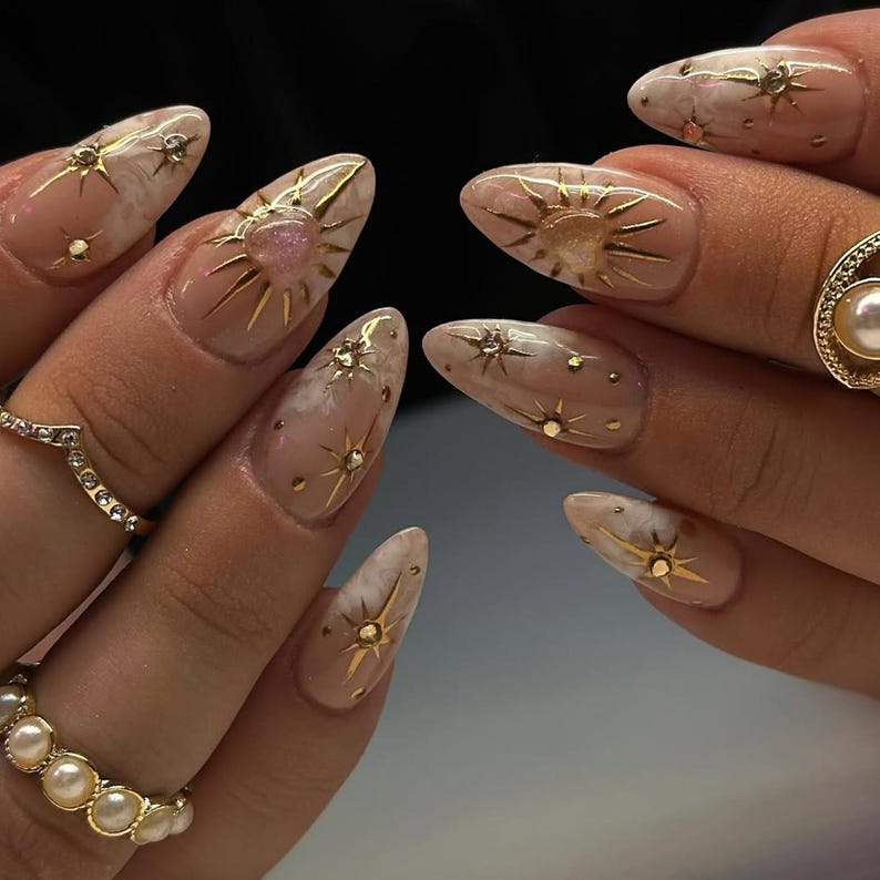 Luxury Nude Gold Almond Nails | Shimmer Gold & Star Fake Nails | Elegant Astrology Nail Art | Ethereal Sun Short Press On Nails